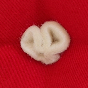 Bílé fleecové knoflíky